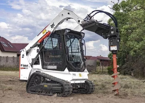 Мини-погрузчик Bobcat с ямобуром